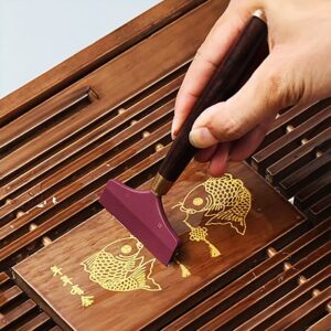 Mini rodo espátula para mesa de chá em uso sobre bandeja de chá